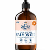 A 1 litre bottle of Skipper's Fresh Scottish Salmon Oil dog supplement, in an amber glass bottle with a black pump dispenser and a light pink and white label.